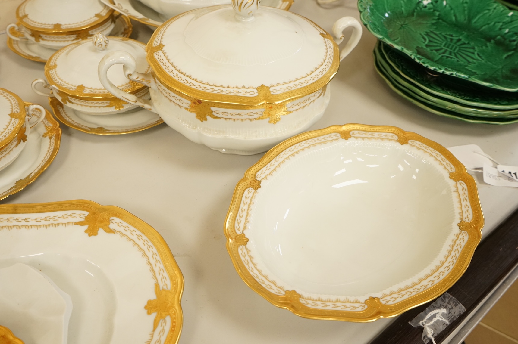 A Haviland Limoges dinner service with gilt border
